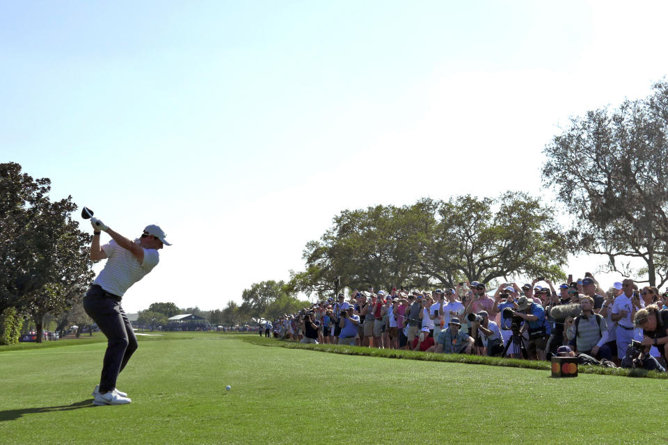 Rory McIlroy, of Northern Ireland, hits from the ninth tee during the second round of the Arnold Palmer Invitational golf tournament Friday, March 4, 2022, in Orlando, Fla. (AP Photo/John Raoux)