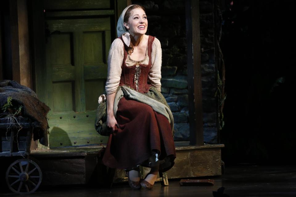 This theater image released by Sam Rudy Media Relations shows Laura Osnes, as Cinderella, during a performance of "Rodgers + Hammerstein's Cinderella on Broadway." (AP Photo/Sam Rudy Media Relations, Carol Rosegg)