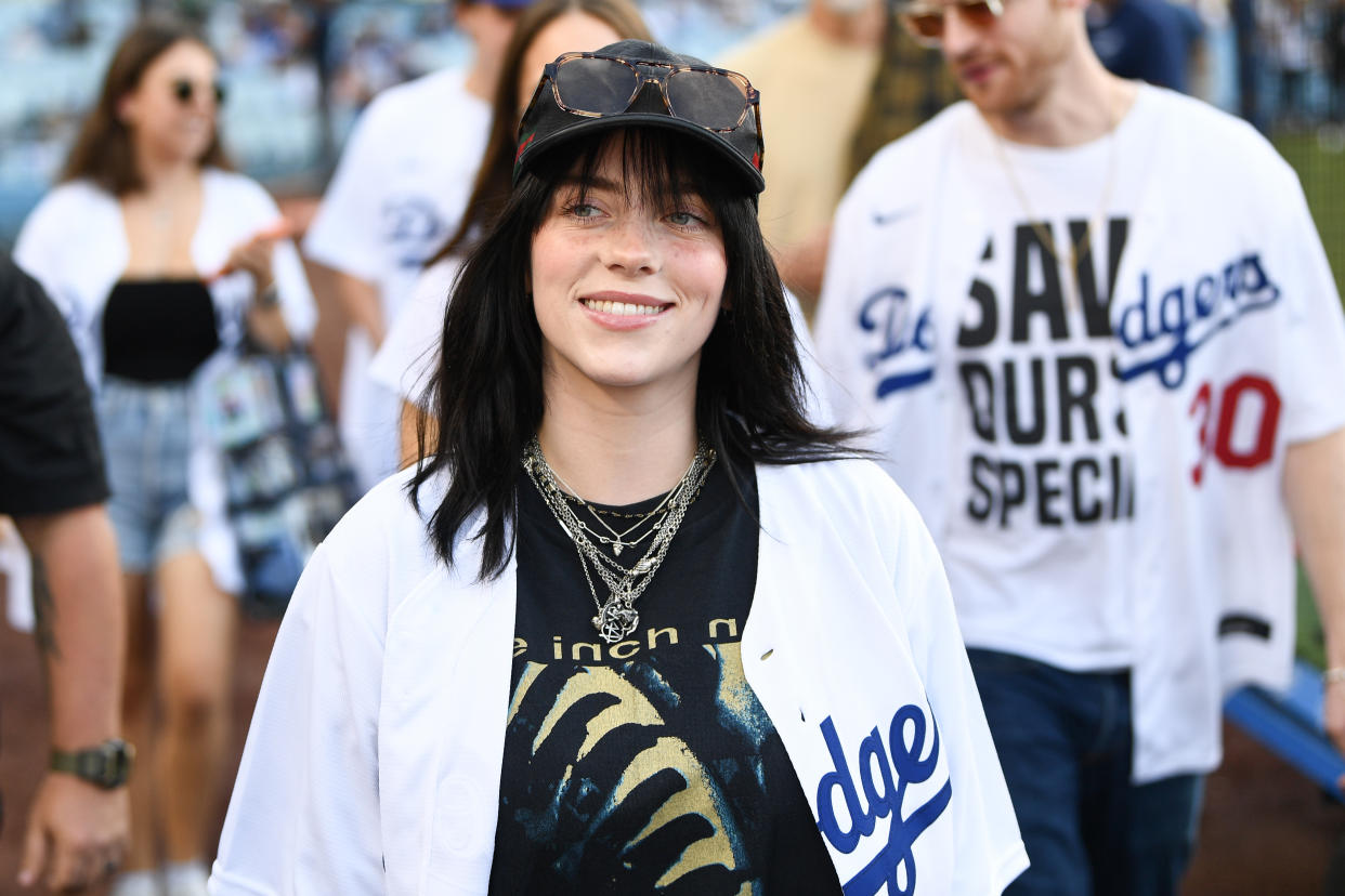 LOS ANGELES, CA - JULY 21: Singer Billie Eilish looks on before the MLB game between the San Francisco Giants and the Los Angeles Dodgers on July 21, 2022 at Dodger Stadium in Los Angeles, CA. (Photo by Brian Rothmuller/Icon Sportswire via Getty Images)