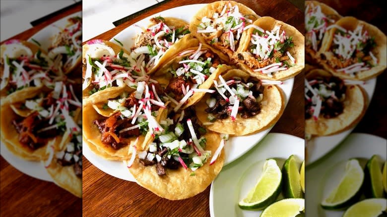 Several tacos on plate