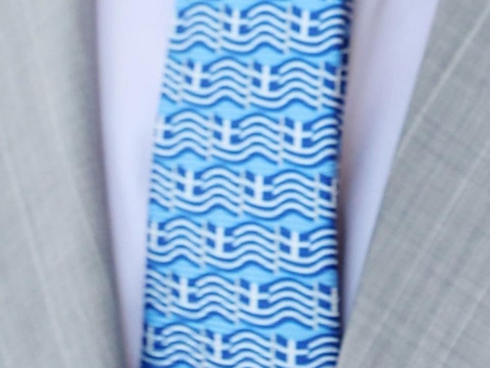 The royal tie, worn at Cop28 summit on Friday (PA)