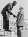 FILE - Rafer Johnson of Kingsburg, Calif., is congratulated by International Olympic Committee President Avery Brundage after presentation of the gold medal for the decathlon event at the Summer Olympics in Rome, Italy, in this Sept., 7, 1960, file photo. Rafer Johnson died Wednesday, Dec. 2, 2020. He was 86. He died at his home in the Sherman Oaks section of Los Angeles, according to family friend Michael Roth (AP Photo)