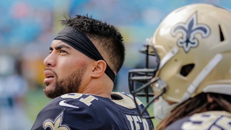 This Sept. 24, 2019, file photo shows New Orleans Saints' Manti Te'o (51) on the sidelines during a game against the Carolina Panthers in Charlotte, N.C.