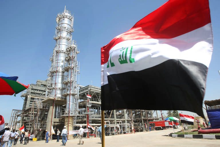 The Iraqi flag flutters at the Al-Dora refinery complex in Baghdad on September 16, 2010. Indian Foreign Minister Salman Khurshid held talks with senior Iraqi officials as New Delhi, Baghdad's biggest buyer of oil, pushes for greater energy security as it looks to ensure sustained economic growth