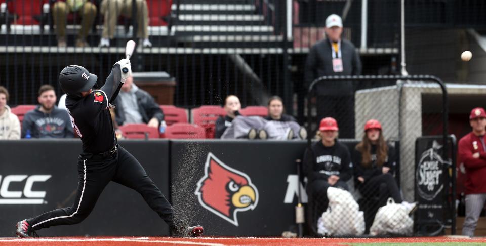 Louisville’s Jack Payton gets a hit at home against Boston College.April 6, 2023