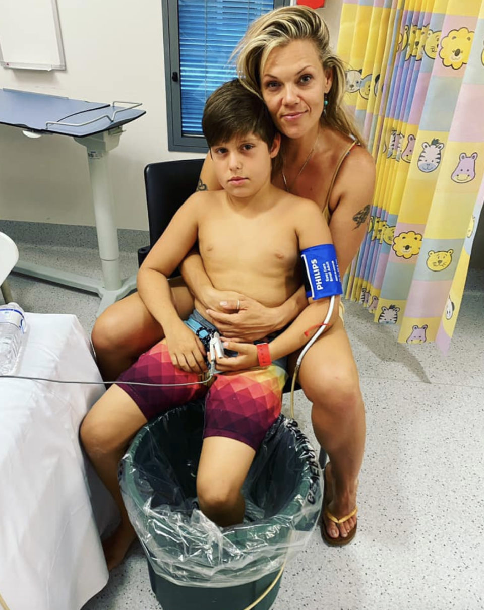 The mum and son pictured together in hospital.