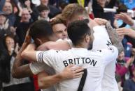 Britain Soccer Football - Swansea City v Stoke City - Premier League - Liberty Stadium - 22/4/17 Swansea City's Tom Carroll celebrates scoring their second goal with team mates Reuters / Rebecca Naden Livepic