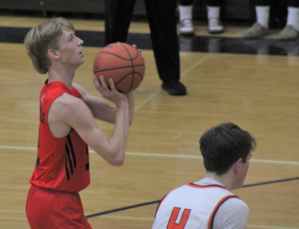 Senior Jadin Mix (left) scored 27 points for the Onaway boys, who captured a home win over Brimley on Monday.