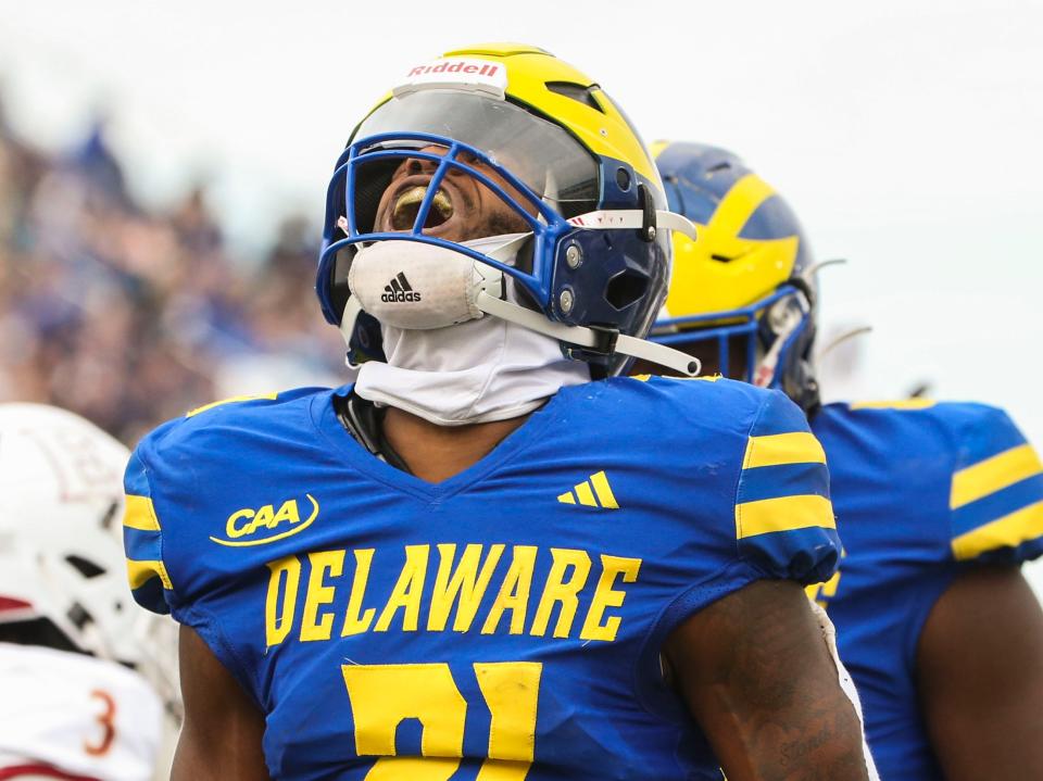Delaware running back Marcus Yarns lets out a yell after scoring in the second quarter against Elon at Delaware Stadium, Saturday, Nov. 4, 2023.