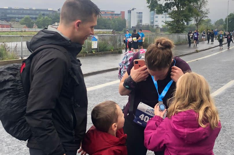 Alex with her two children, and husband Adam