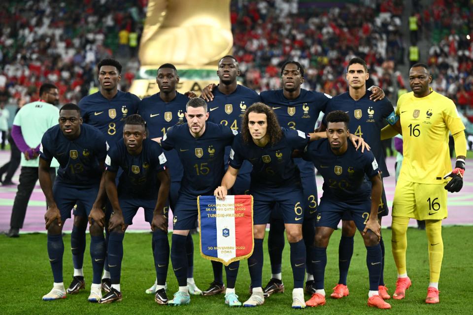 (Top, L-R) France's midfielder #08 Aurelien Tchouameni, forward #12 Randal Kolo Muani, defender #24 Ibrahima Konate, defender #03 Axel Disasi, defender #04 Raphael Varane, goalkeeper #16 Steve Mandanda and (bottom, L-R) midfielder #13 Youssouf Fofana, midfielder #25 Eduardo Camavinga  midfielder #15 Jordan Veretout, midfielder #06 Matteo Guendouzi and forward #20 Kingsley Coman pose for the team picture ahead of the Qatar 2022 World Cup Group D football match between Tunisia and France at the Education City Stadium in Al-Rayyan, west of Doha on November 30, 2022. (Photo by Jewel SAMAD / AFP) (Photo by JEWEL SAMAD/AFP via Getty Images)