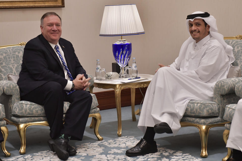 From left, U.S. Secretary of State Mike Pompeo meets with Qatar's Foreign Minister Sheikh Mohammed bin Abdulrahman Al Thani before a peace signing ceremony between the U.S. and the Taliban in Doha on Saturday, Feb. 29, 2020. The U.S. is poised to sign a peace agreement with Taliban militants on Saturday aimed at bringing an end to 18 years of bloodshed in Afghanistan and allowing U.S. troops to return home from America's longest war. (Giuseppe Cacace/Pool photo via AP)