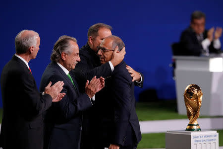 Funcionarios de la propuesta conjunta de EEUU, México y Canadá celebran la elección de su candidatura como la ganadora para organizar el Mundial 2026. Jun 13, 2018. REUTERS/Sergei Karpukhin