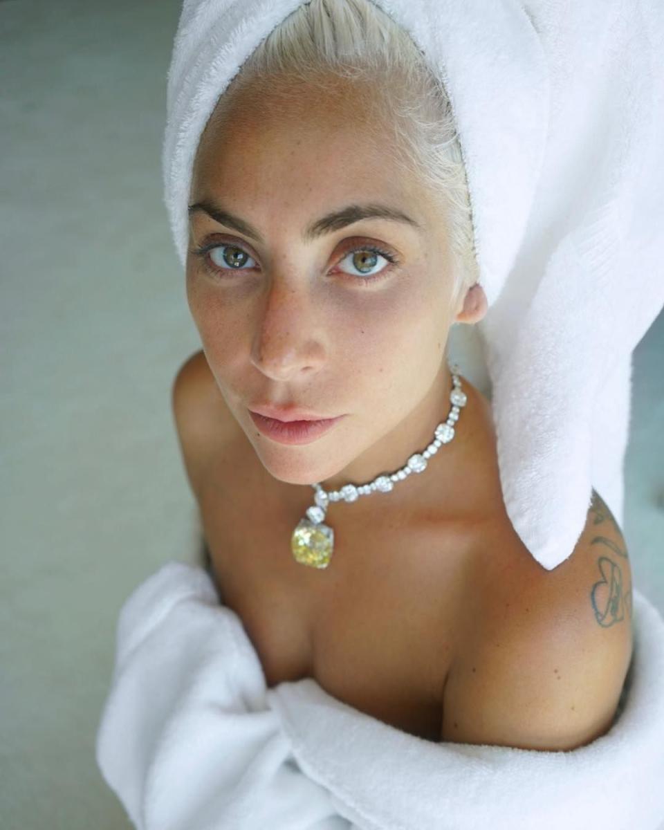 Lady Gaga with her hair in a towel