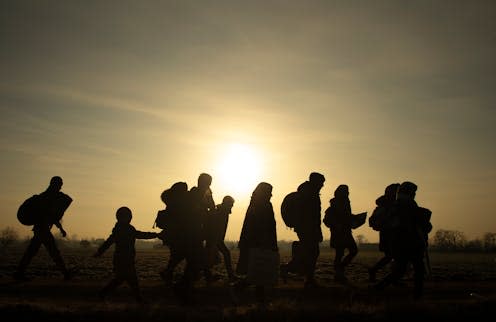 <span class="attribution"><a class="link " href="https://www.shutterstock.com/image-photo/migrants-walk-towards-turkeys-pazarkule-border-1830065513" rel="nofollow noopener" target="_blank" data-ylk="slk:Lumiereist/Shutterstock;elm:context_link;itc:0;sec:content-canvas">Lumiereist/Shutterstock</a></span>