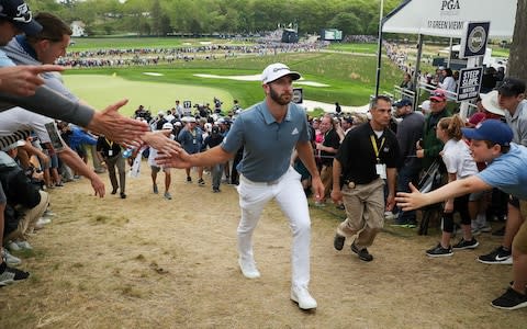  Dustin Johnson of the United States walks from the 17th green during the final round of the 2019 PGA Championship - Credit: Getty images