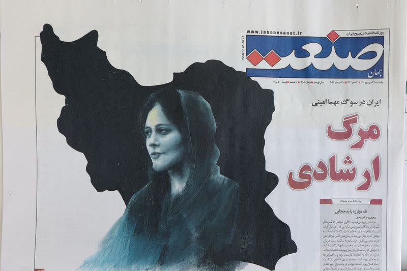 FILE PHOTO: Newspapers with Amini, a victim of country's "morality police", are seen in Tehran