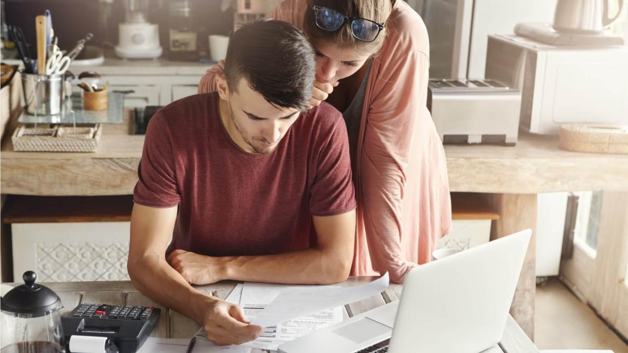 couple doing their finances at home