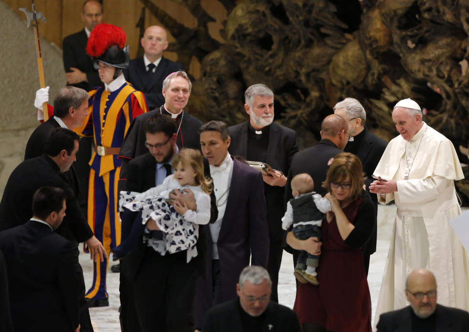 Pope Francis attends an audience with members of the Neocatechumenal Way missionary movement, in the Paul VI hall, at the Vatican, Saturday, Feb. 1, 2014. Francis met with thousands members of the Neocatechumenal Way, a community founded in Spain in the 1960s that seeks to train Catholic adults in their faith and is known for sending large families as missionaries around the world. (AP Photo/Riccardo De Luca)