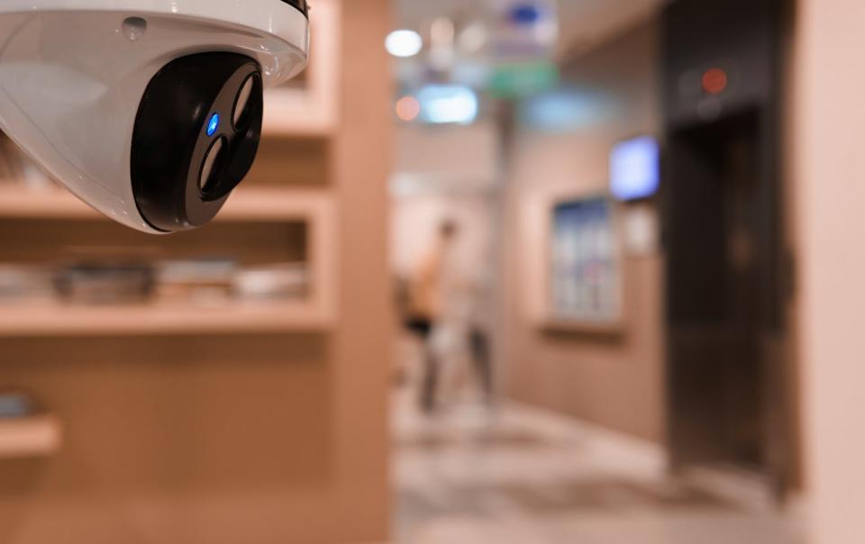 A close up of an indoor security camera.