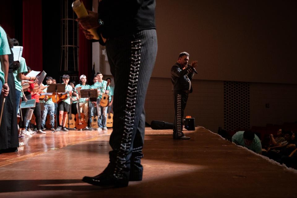 John Vela, Robstown High School's mariachi camp director, leads a mariachi camp performance at Robstown High School, on Thursday, June 29, 2023, in Texas.