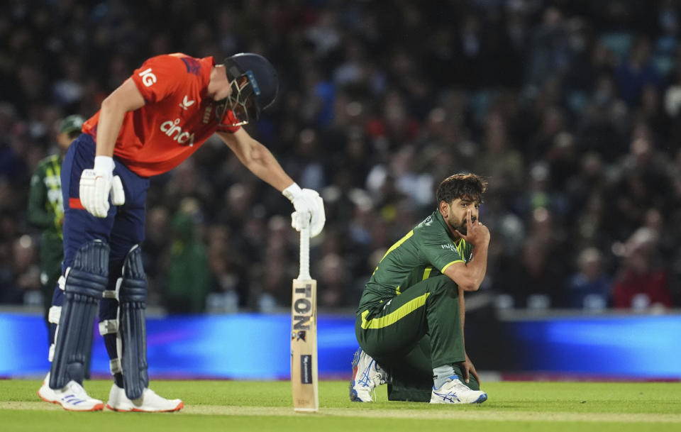 Pakistan's Haris Rauf kneels on the pitch during the fourth IT20 match between England and Pakistan in London, England, Thursday, May 30, 2024. (Adam Davy/PA via AP)