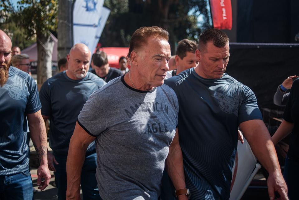 US actor and former California Governor Arnold Schwarzenegger (C) is seen at the Arnold Classic Africa, a multi-sport festival held at the Sandton Convention Centre on May 18, 2019 in Johannesburg, South Africa. (Photo by Michele Spatari / AFP)        (Photo credit should read MICHELE SPATARI/AFP/Getty Images)
