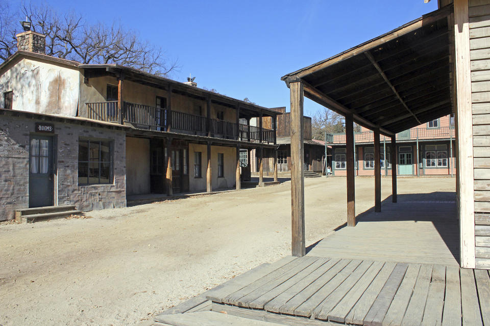 This Dec. 13, 2015 photo shows Paramount Ranch, a frontier western town built as a movie set that appeared in countless movies and TV shows, in Agoura Hills in Southern California. It was destroyed in the Woolsey fire. Southern Californians faced with the loss of lives and homes in a huge wildfire are also grappling with the destruction of public lands popular with hikers, horseback riders and mountain bikers. The Woolsey fire has charred more than 85 percent of National Park Service land within the Santa Monica Mountain National Recreational Area, where officials announced Wednesday, Nov. 14, 2018 that all trails were closed. (AP Photo/John Antczak)