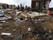 The home of Jeff and Carla Bullard was destroyed by an apparent tornado Sunday, Jan. 22, 2017, in Cook County, Ga. Georgia Gov. Nathan Deal has declared a state of emergency in seven counties that have suffered deaths, injuries and severe damage from weekend storms. (AP Photo/Brendan Farrington)