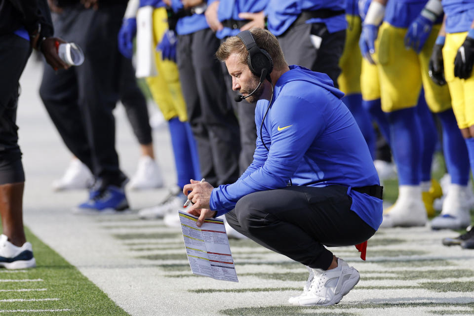 Los Angeles Rams head coach Sean McVay crouches on the sideline during the second half of an NFL football game against the Philadelphia Eagles Sunday, Oct. 8, 2023, in Inglewood, Calif. (AP Photo/Kevork Djansezian)