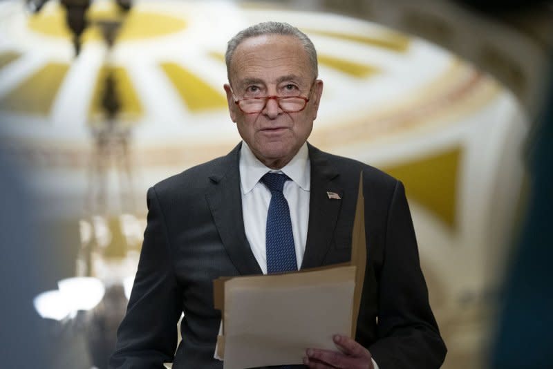 Senate Majority Leader Chuck Schumer, D-N.Y. urged House Speaker Mike Johnson to avoid the "siren song of the hard right" and work with Democrats to avoid threats to shut down government in the future. The budget bill passed the Senate easily 87-10. Photo by Bonnie Cash/UPI