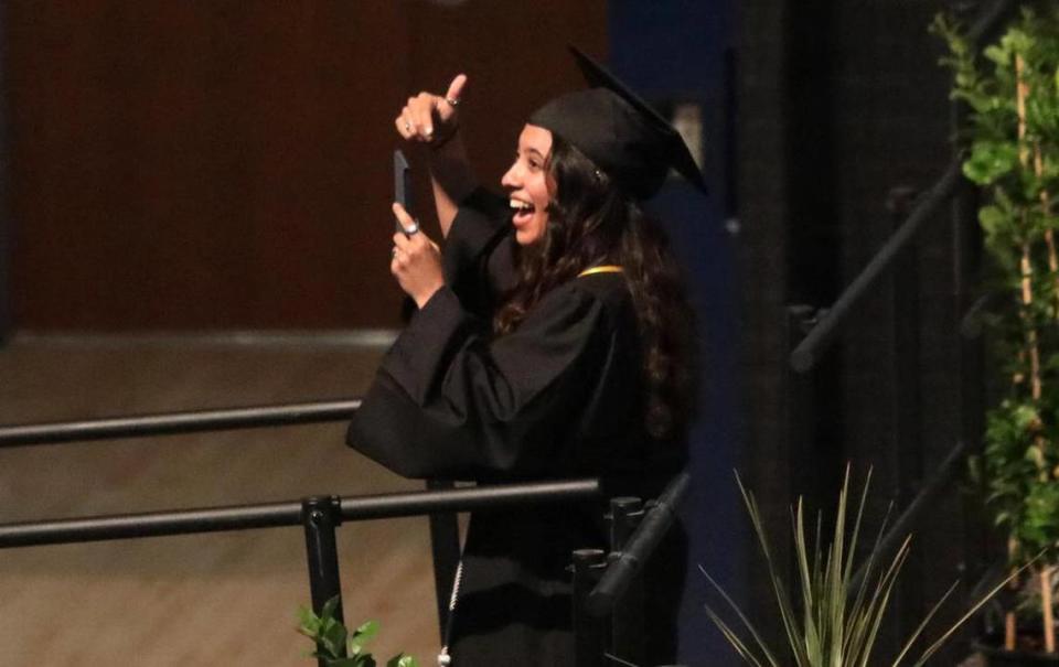 A West Hills College Lemoore graduate shows her emotion during May 25, 2023 commencement at Golden Eagle Arena.