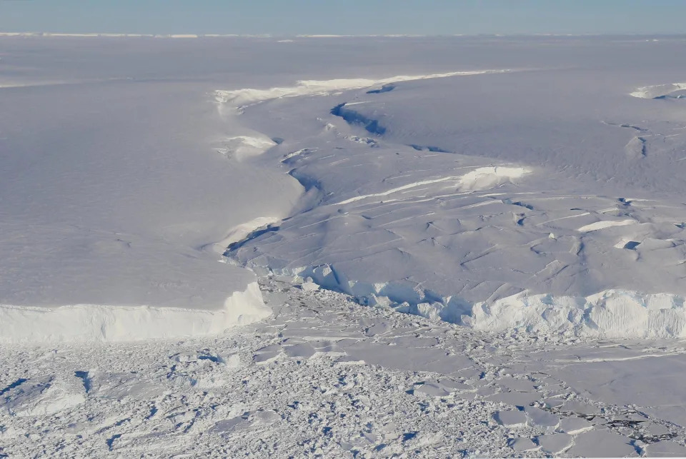 A newly discovered fissure in the Thwaites ice shelf. Scientists predict the shelf could crack like a car window in five years. - Credit: Erin Pettit