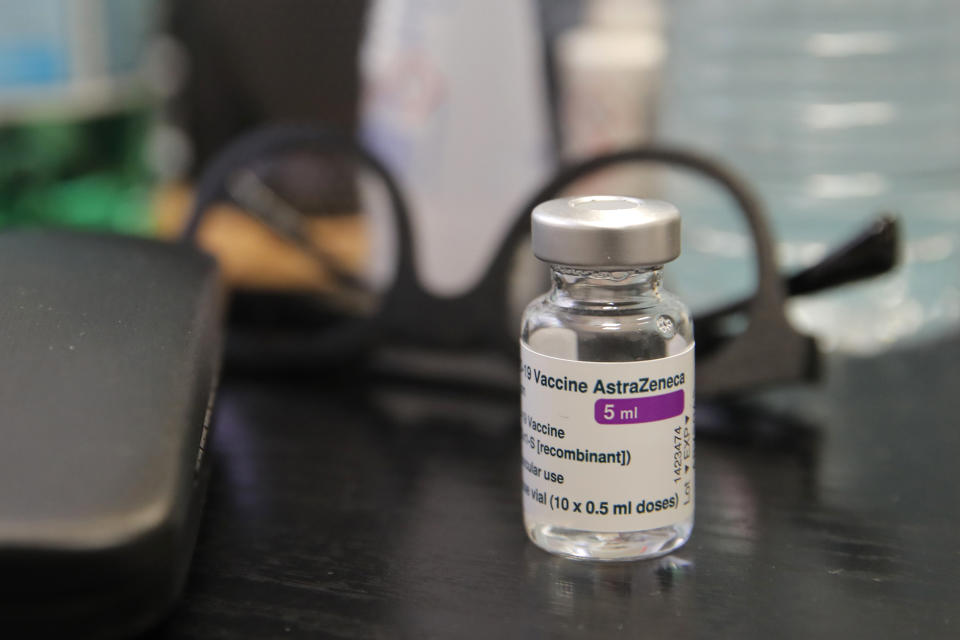 FILE - In this Feb.25, 2021 file photo, a vial of AstraZeneca COVID-19 vaccine is pictured at a family doctor office in Paris. First, France's president suggested the AstraZeneca vaccine was "quasi-ineffective" in protecting older people from the coronavirus. Now, his government is pleading with French medical staff to take it. Top French and German officials are urging people to take the AstraZeneca vaccine amid skepticism from some who fear it is not effective enough. (AP Photo/Christophe Ena, File)