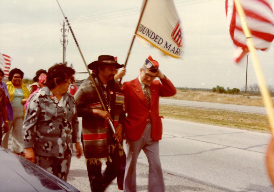 Dr. Clotilde P. García, labor activist Antonio Orendain and Dr. Héctor P. García participate in a march in support of farmworkers.