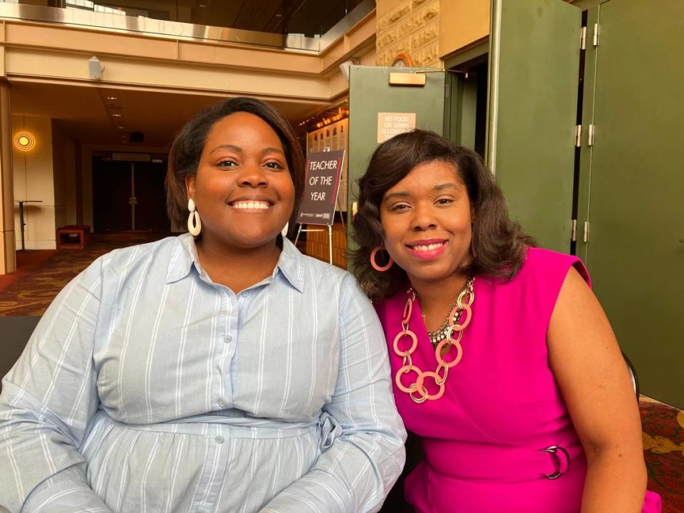 Nicole Hodge of Britt David Magnet Academy, left, and Tasca Blanding of Gentian Elementary School pose for a photo Jan. 24, 2024, in the RiverCenter for the Performing Arts after they were announced among the 55 nominees for the Muscogee County School District Teacher of the Year Award. Blanding taught Hodge in fourth grade at Waddell Elementary School. Mark Rice/mrice@ledger-enquirer.com