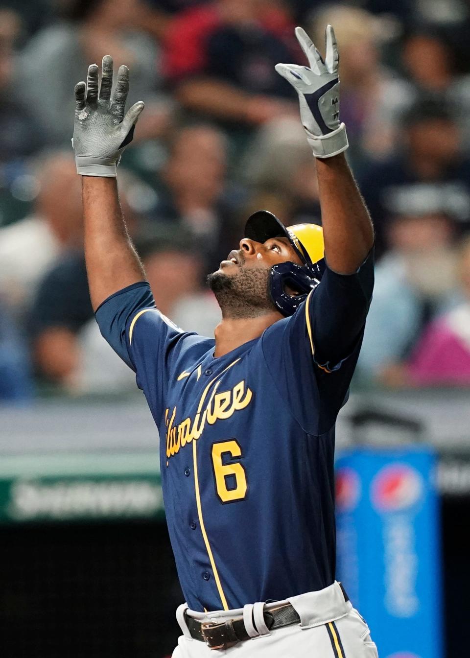 Milwaukee Brewers' Lorenzo Cain celebrates a grand slam during a game last season. Cain's offensive production dropped significantly in 2022 following an injury-plagued 2021. The Brewers designated him for assignment on Saturday, ending his second stint with the club that drafted him in 2004.