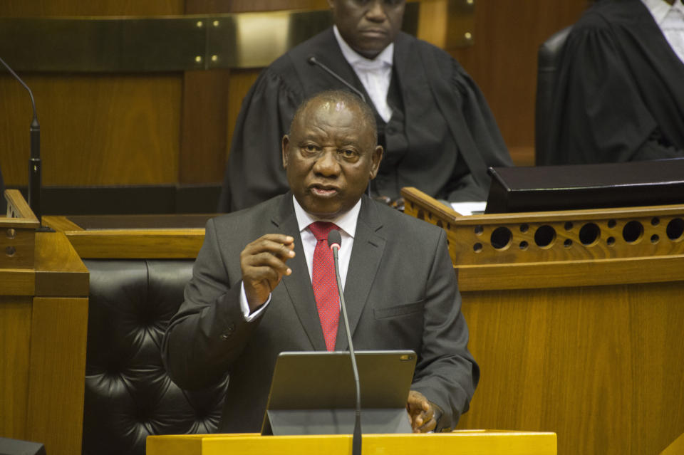 South African President Cyril Ramaphosa delivers his State of the Nation Address in parliament in Cape Town, South Africa, Thursday, June 20, 2019. (Rodger Bosch/Pool Photo via AP)