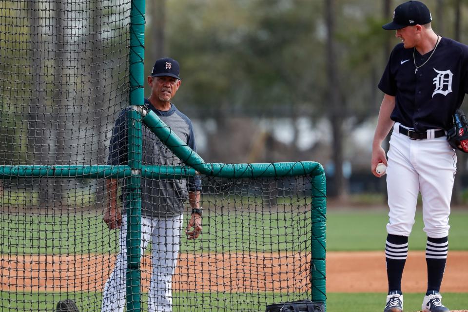 Pitching coach Juan Nieves talks to Beau Burrows during Detroit Tigers spring training at TigerTown in Lakeland, Fla., Wednesday, Feb. 19, 2020.