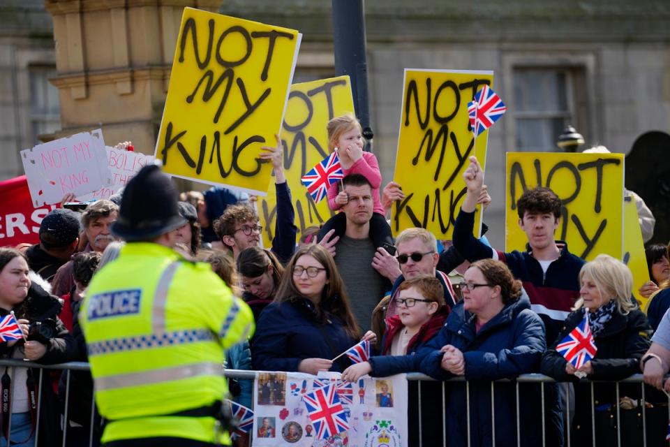 Anti-monarchy demonstrators were arrested in the hours before the procession (AP)