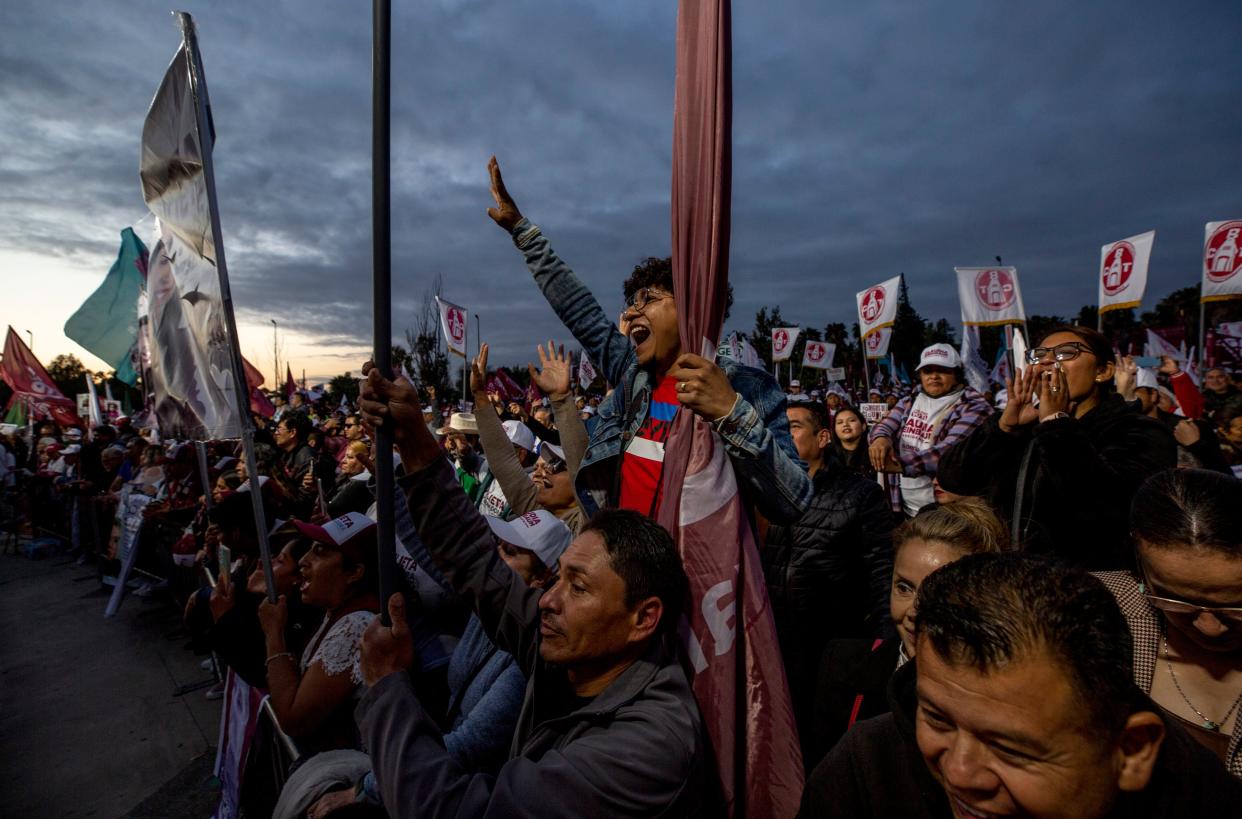 Supporters of Claudia Sheinbaum, the Mexican presidential candidate for the MORENA ruling party, attend a political rally at The Tromp Interactive Museum in the border city of Tijuana, Mexico on Friday, April 12.