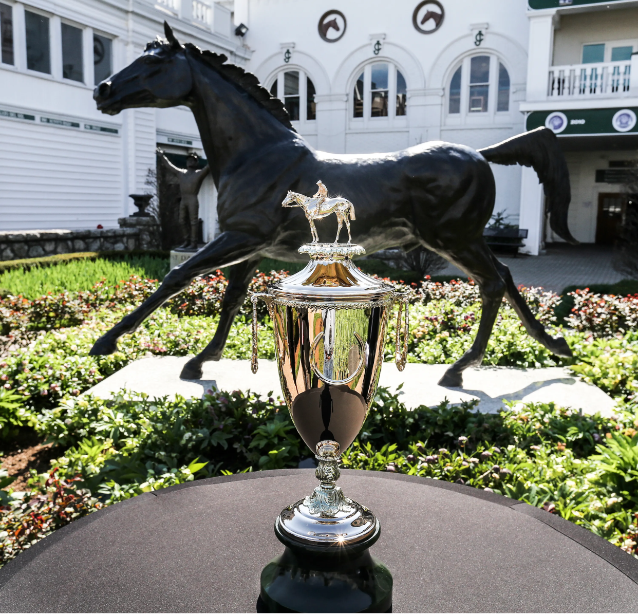 The Kentucky Derby 143 trophy photographed against the Aristides statue at Churchill Downs. April 5, 2017