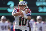 New England Patriots quarterback Mac Jones (10) calls an audible at the line of scrimmage during the first quarter of an NFL football game against the New York Jets, Sunday, Oct. 30, 2022, in New York. (AP Photo/John Minchillo)