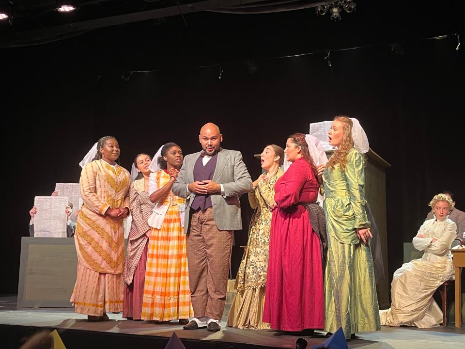 Orlando Montalvo, center, as the defendant Edwin surrounded by ladies of the jury in "Trial by Jury" at College Light Opera Company.