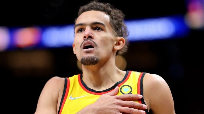 Trae Young of the Atlanta Hawks reacts after shooting a three-point basket against the Los Angeles Lakers Sunday night at State Farm Arena in Atlanta. (Photo: Kevin C. Cox/Getty Images)