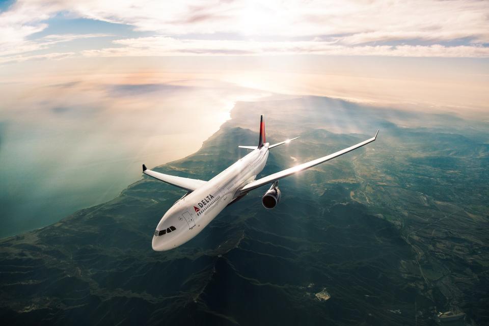 Aerial view of a delta airplane in flight