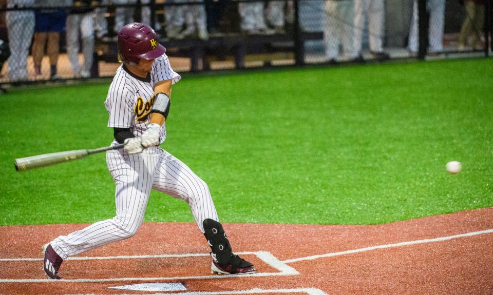 North's Dylan Barrow (23) hits against Columbus East during the IHSAA semi-final sectional game at Bloomington High School South on Friday, May 27, 2022.