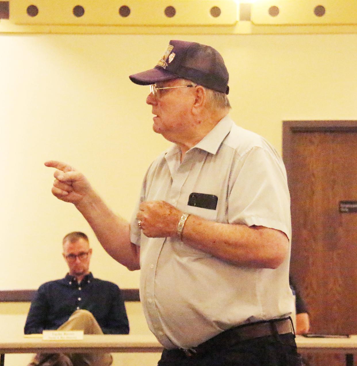 Pontiac resident Dale Carstens speaks to the city council regarding potential drainage problems along Indiana Avenue at the council's meeting Monday at the Eagle Theater.