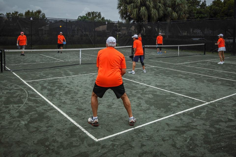 Pickleball has become a popular sport in central Palm Beach County, where The Pickleball Club of Sarasota wants to build a private, 16-court indoor complex in Greenacres. The Shores Boomer Pickleball League, seen here in November 2021, has played at the Valencia Shores community west of Lake Worth Beach. Valencia Shores installed the courts over tennis courts as pickleball's popularity continues to grow.