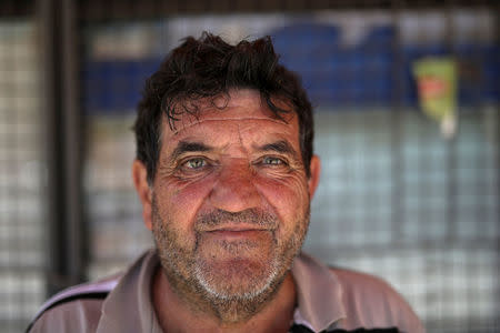 Slobodan, once an electrician now working on his farm where he plants potatoes, poses for a portrait in the village of Mralino near Skopje, Macedonia, May 31, 2018. "I have no idea about new name and I don't care as I'm not following the politics. During Yugoslavia I served as a solider in Rijeka, Croatia and that period of our life was the best," Slobodan said. REUTERS/Marko Djurica